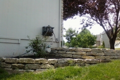 Full Features Landscape and Garden Center small retaining walls and bedding areas