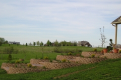 Full Features Landscape and Garden Center small retaining walls and bedding areas